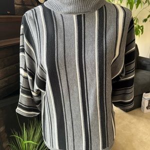 Light weight sweater. Gray, black and white.